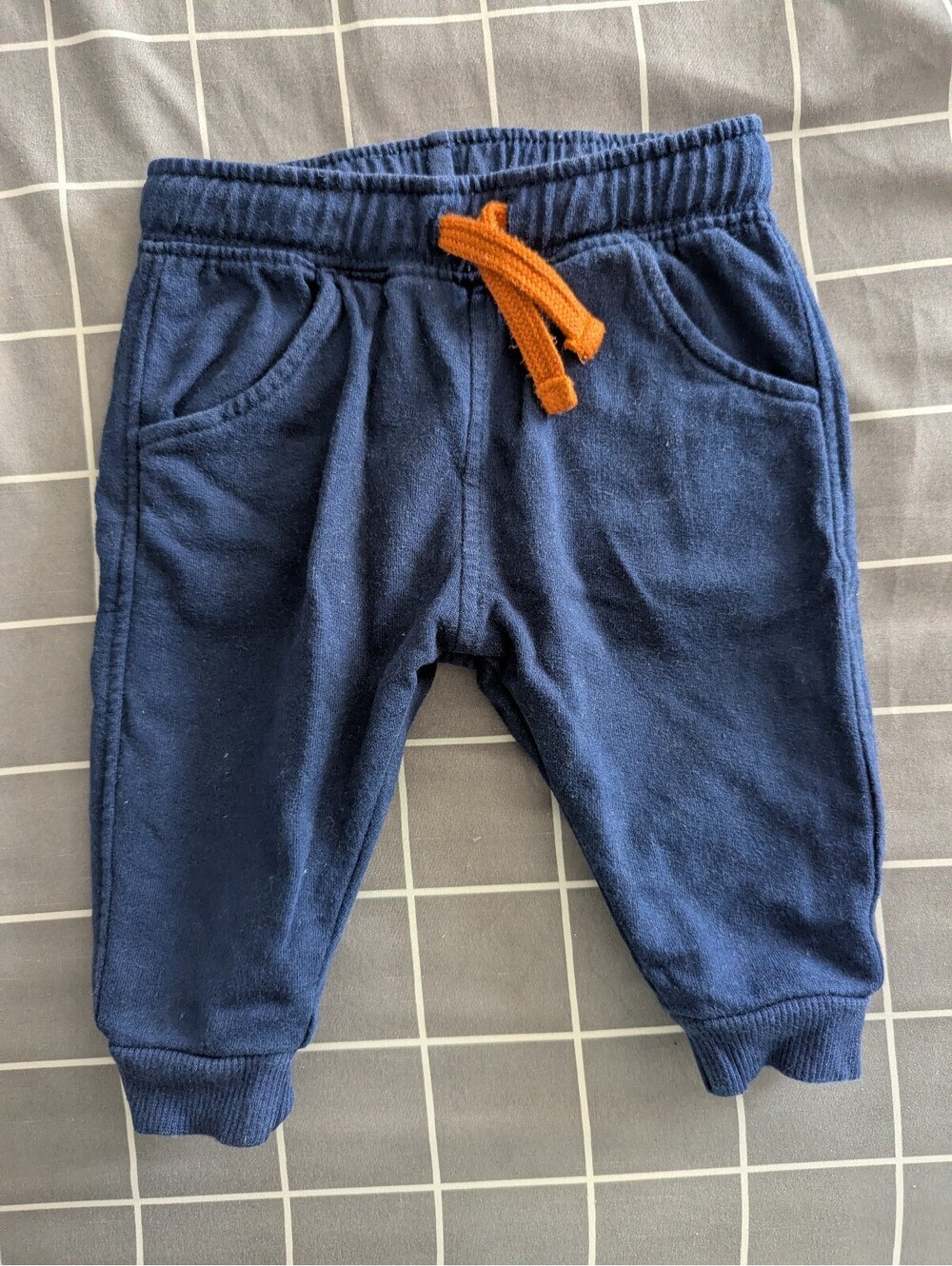Tu blue pants with orange drawstring